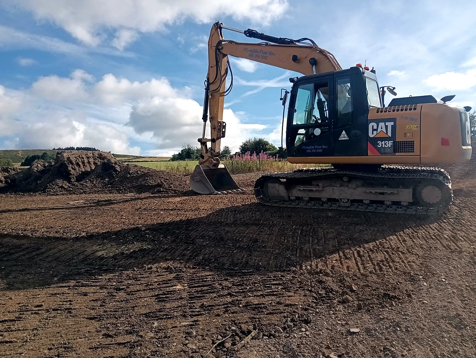 Tracked excavator on an earthworks site